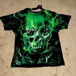 Really cool flamming skull t shirt . Has that vintage look